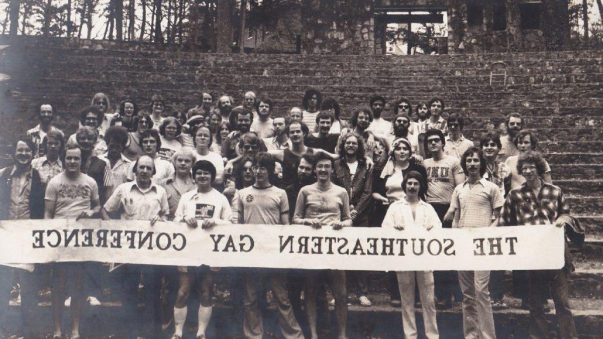 People holding a sign.